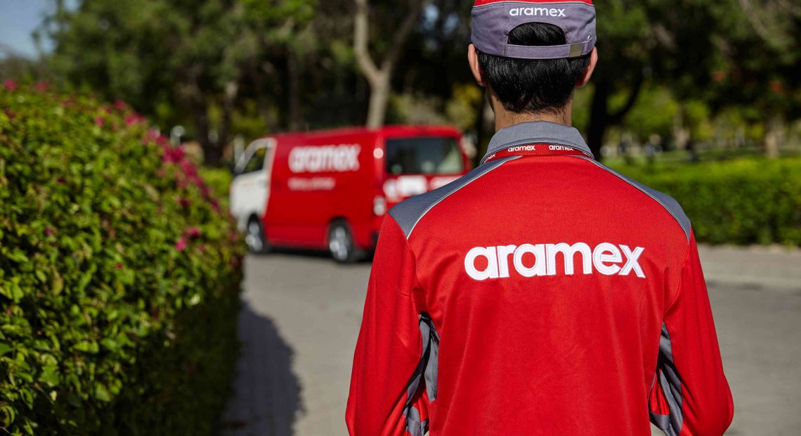 Aramex courier makes a delivery. Image: Aramex